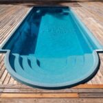 Wooden pool deck swimming pool