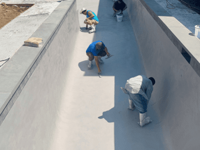 men working on the pool with safety tools men working on the pool with safety tools