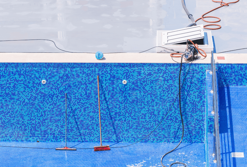 vacuum tools in the pool to remove dirt or debris