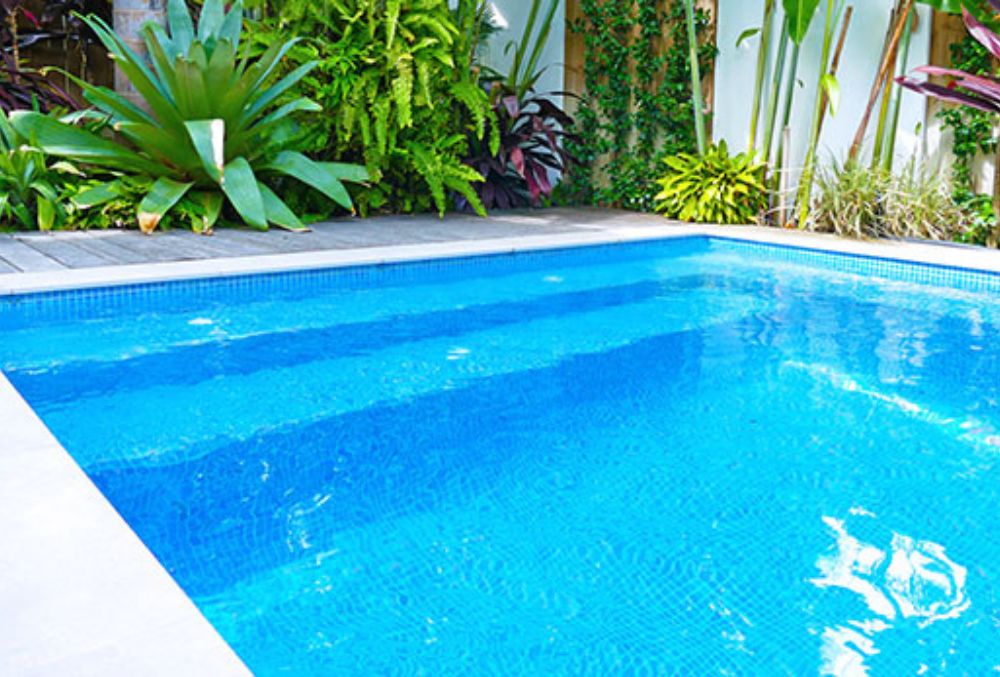 Glasscoat pool resurfacing with a glossy, smooth finish that provides superior durability and a sleek, modern appearance.